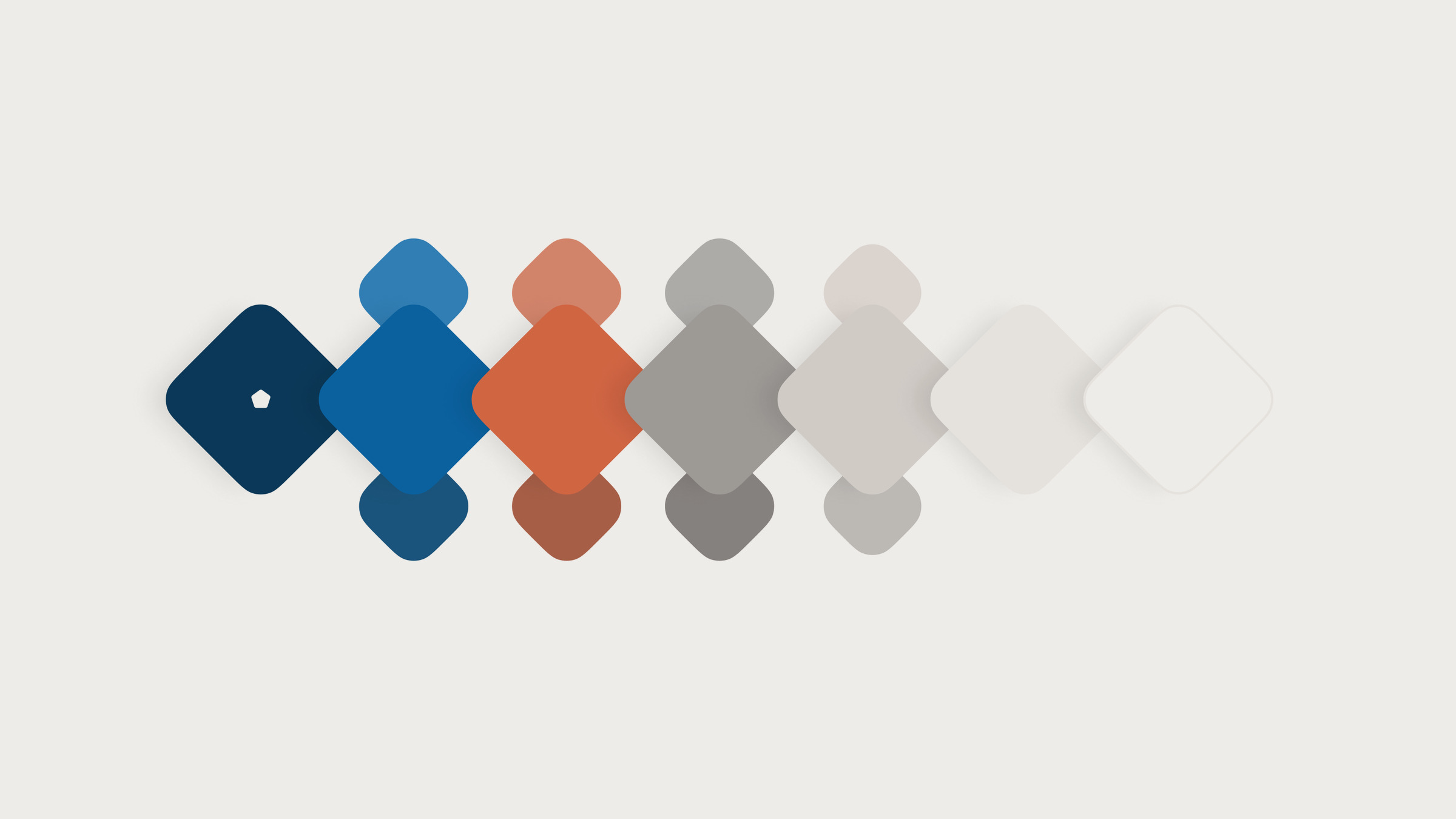 The JOL brand palette as overlapping rounded diamonds: navy, blues, coral, grays and fog.